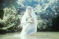 Veiled woman in Fano Lake