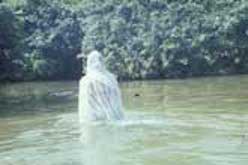 Veiled woman in Fano Lake