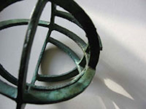 Detail of small bronze orb sculpture