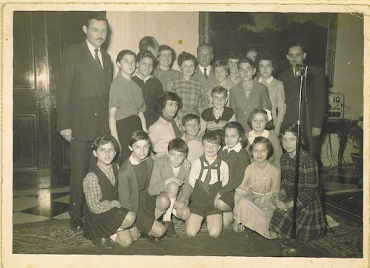 Group of children in Radio Belgrade with President Tito
