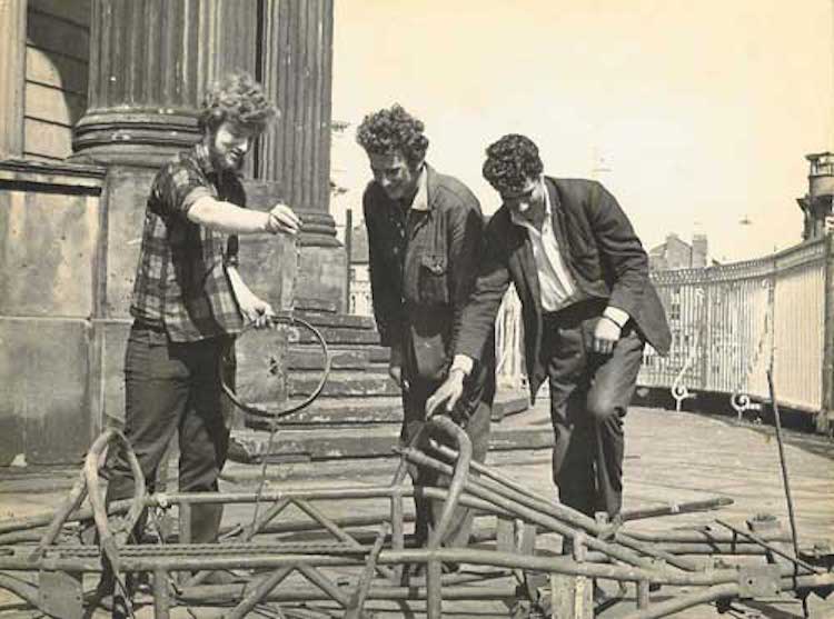 Slobodan and two men working on the sculpture