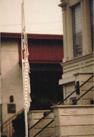 Vertical sculpture at house front steps