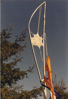 Vertical sculpture with lace inset